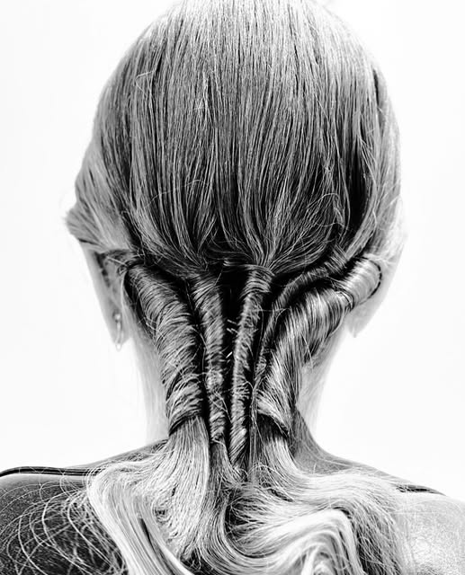 Black and white image of sculpted hair